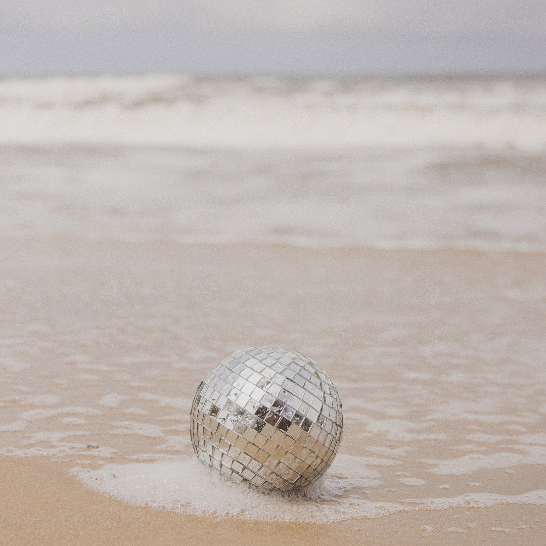 Disco ball on the beach